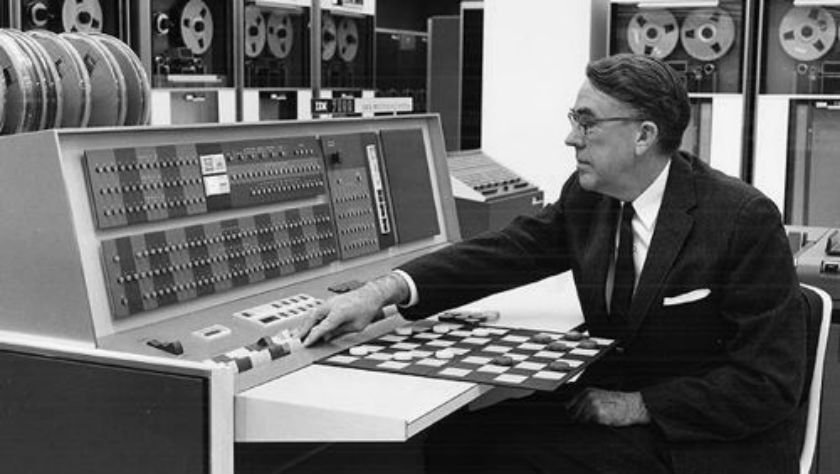 Arthur L. Samuel using an IBM 7094